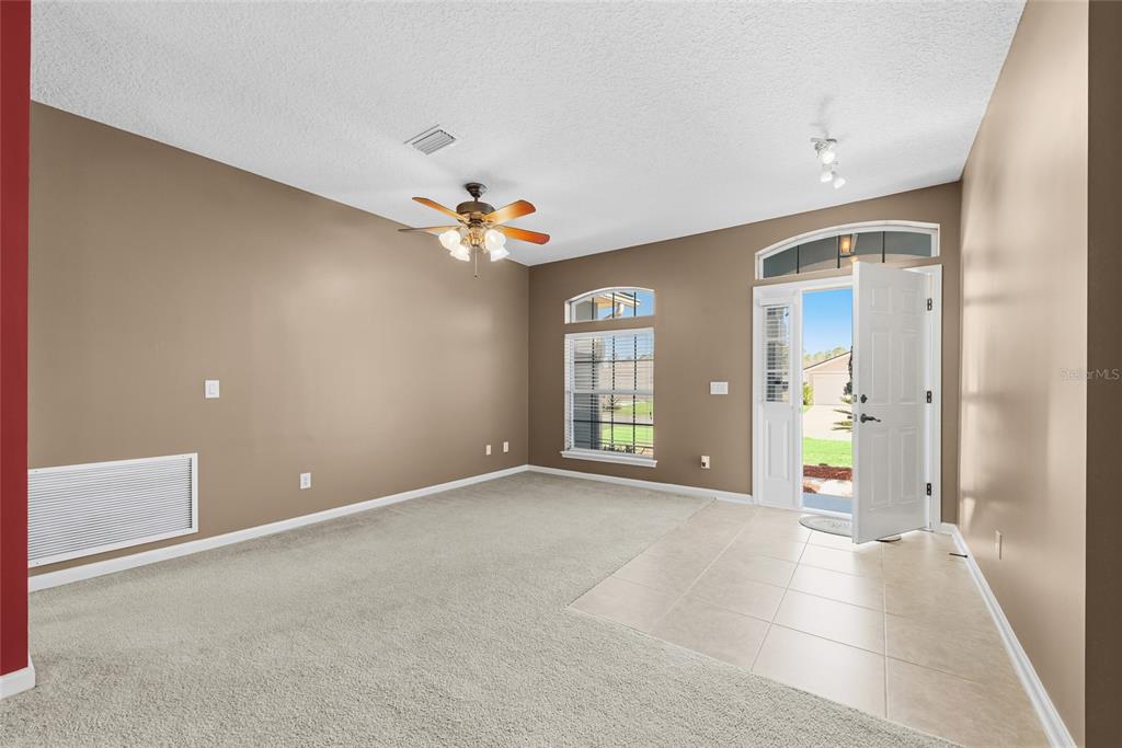 45095 Dutton Way Callahan, FL 32011 - Photo 7 of 36 a view of an empty room with a window