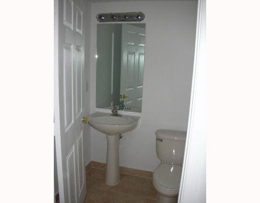 2928 Hidden Hills Road, Unit 1403 West Palm Beach, FL 33411 - Photo 4 of 13 a bathroom with a sink and toilet