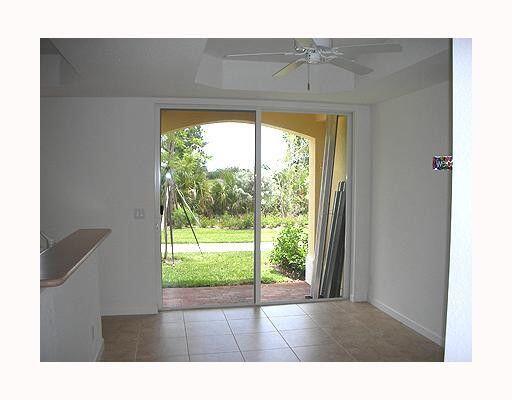 2928 Hidden Hills Road, Unit 1403 West Palm Beach, FL 33411 - Photo 8 of 13 a bathroom with a window