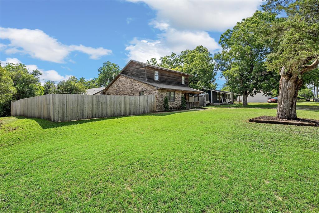 3000 North 15th A Street Waco, TX 76708 - Photo 22 of 24 a view of a backyard with a garden