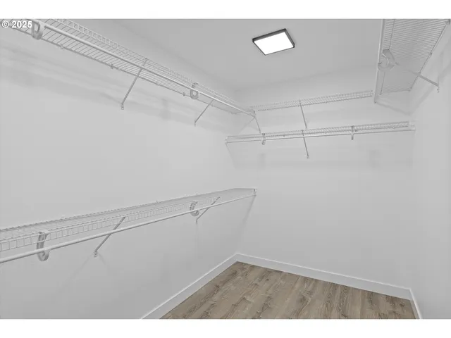 a view of a room with racks on the wall