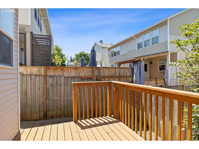 a view of a wooden fence