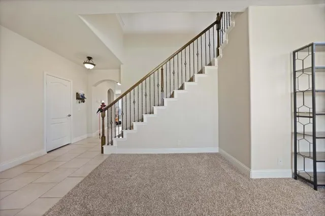 a view of hallway with stairs