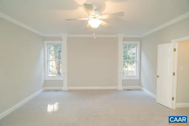 a white bath tub sitting next to a window