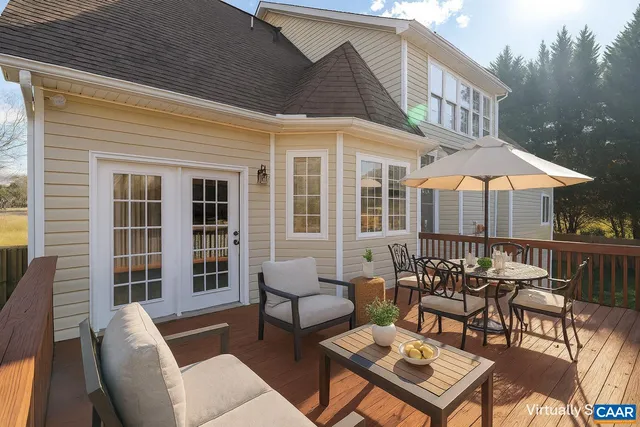 a view of entryway with wooden floor and stairs