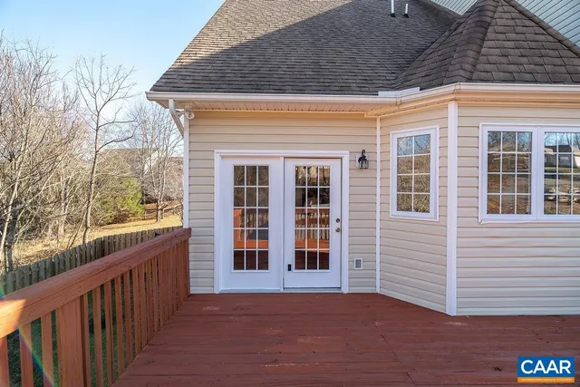 a bathroom with a sink tub vanity and a mirror