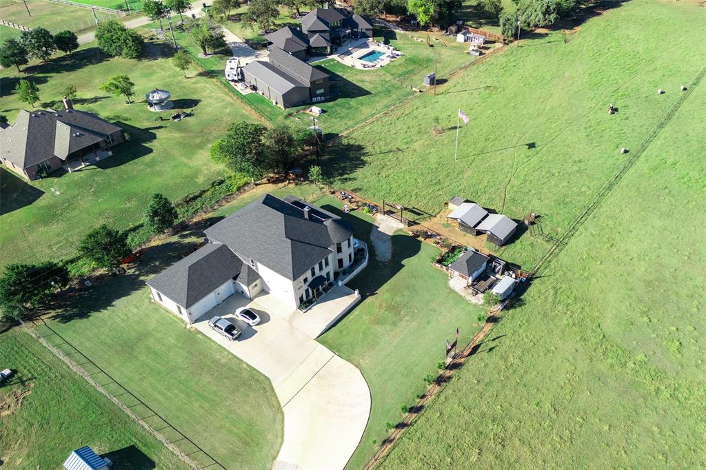 2630 Rockhill Road Aubrey, TX 76227 - Photo 2 of 36 an aerial view of a house with a yard