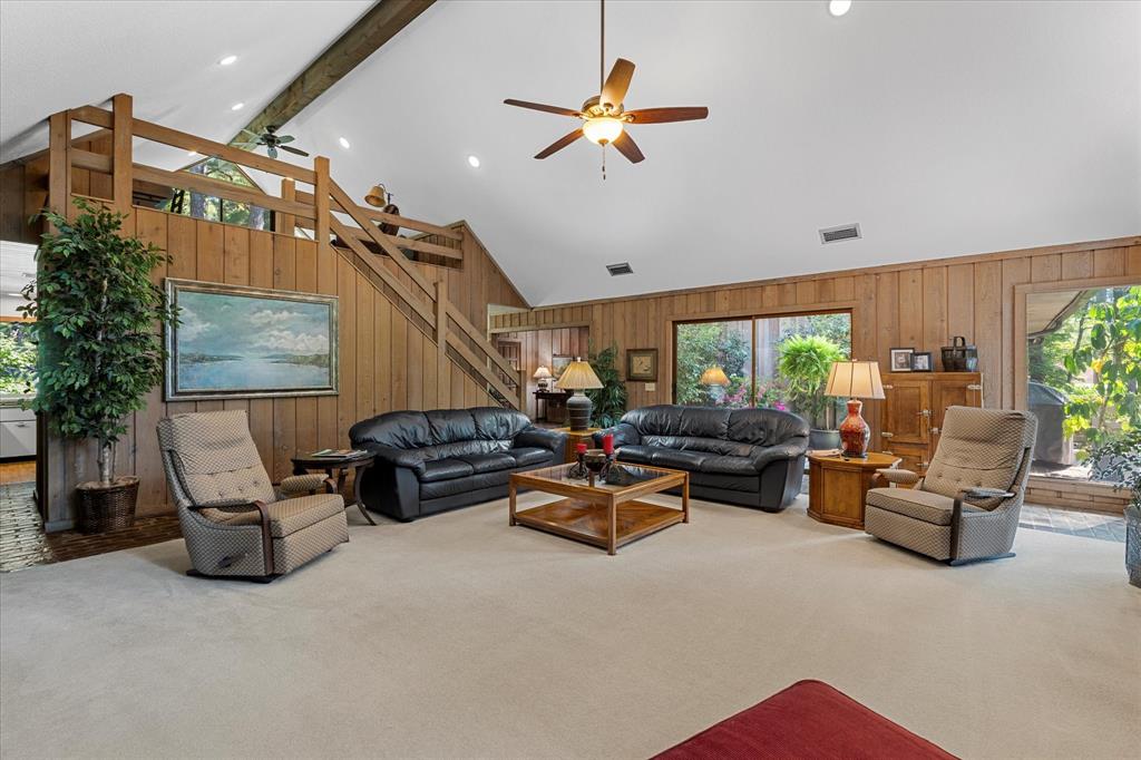 1200 North Acres Circle Springhill, LA 71075 - Photo 11 of 40 a living room with furniture gym equipment and a window