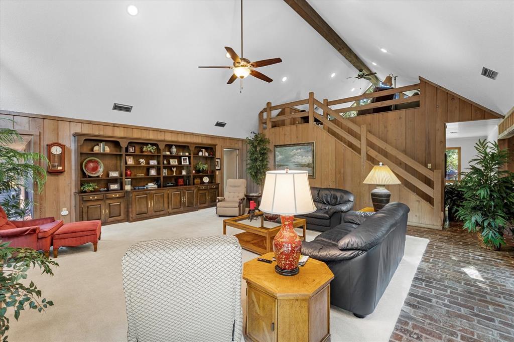 1200 North Acres Circle Springhill, LA 71075 - Photo 13 of 40 a living room with furniture and potted plants