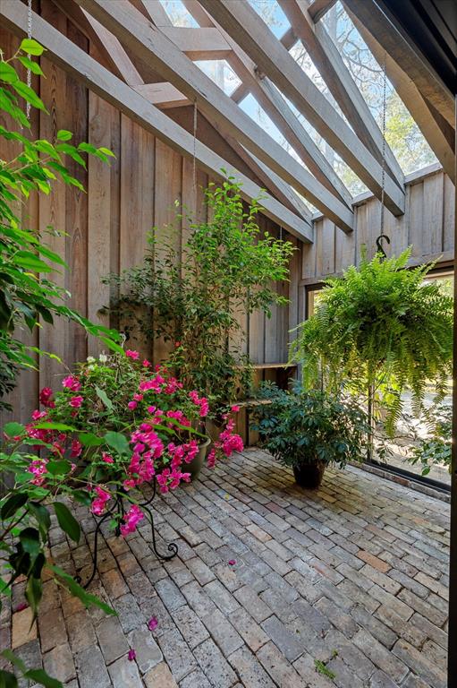 1200 North Acres Circle Springhill, LA 71075 - Photo 15 of 40 a view of a potted flower in front of a house