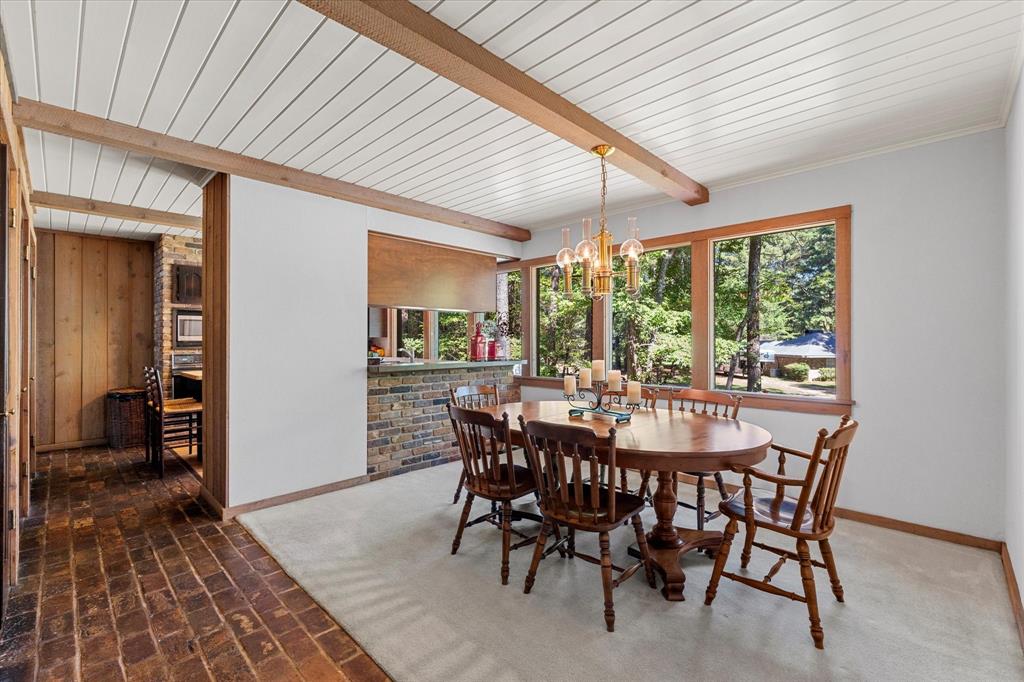 1200 North Acres Circle Springhill, LA 71075 - Photo 23 of 40 a dining room with furniture window wooden floor
