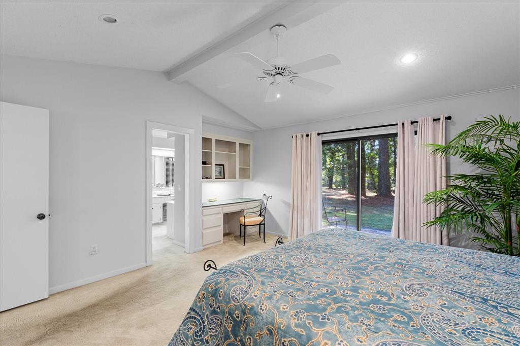 1200 North Acres Circle Springhill, LA 71075 - Photo 26 of 40 a spacious bedroom with a bed and a window