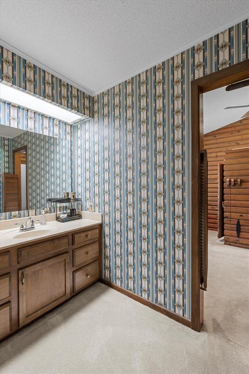 1200 North Acres Circle Springhill, LA 71075 - Photo 30 of 40 a bathroom with a double vanity sink and mirror