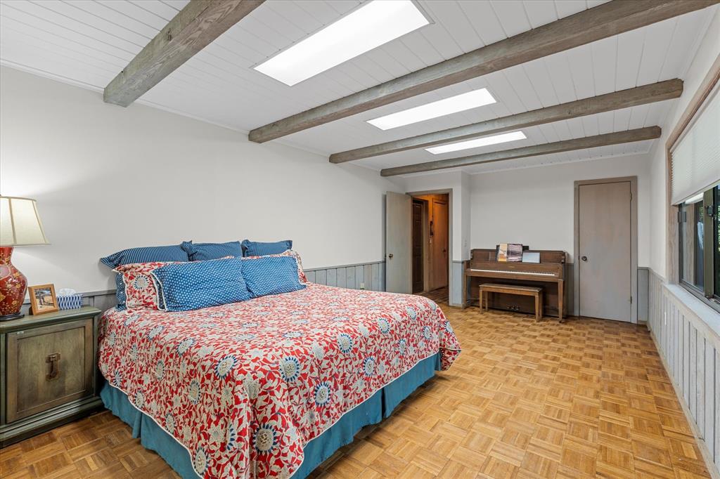 1200 North Acres Circle Springhill, LA 71075 - Photo 34 of 40 a bedroom with a bed and a fireplace