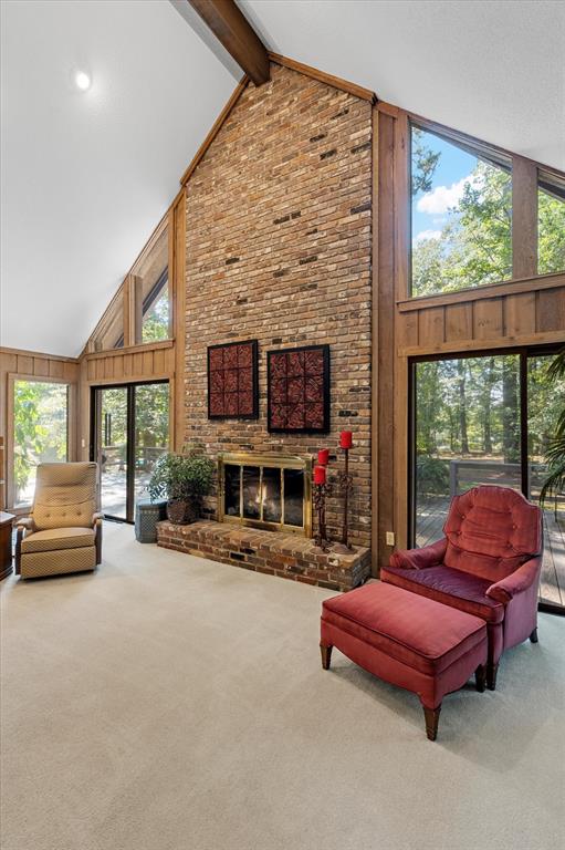 1200 North Acres Circle Springhill, LA 71075 - Photo 10 of 40 a outdoor living space with furniture and a fireplace