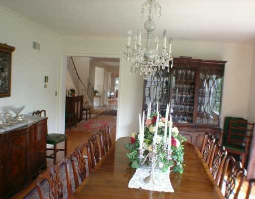Undisclosed Address Greenwich, CT 06830 - Photo 4 of 7 a view of a dining room with furniture and chandelier