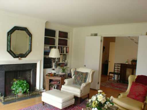 Undisclosed Address Greenwich, CT 06830 - Photo 6 of 7 a living room with furniture and a fireplace