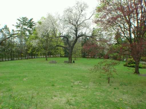 Undisclosed Address Greenwich, CT 06830 - Photo 7 of 7 a view of outdoor space with deck and yard