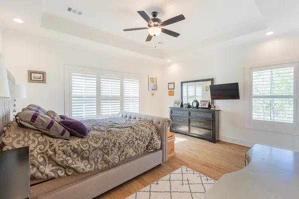 a bedroom with furniture and a bed