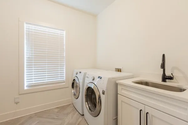 a utility room with dryer and washer