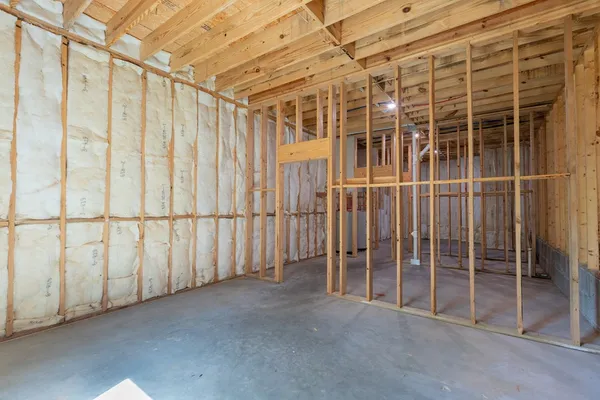 a view of a room with wooden walls