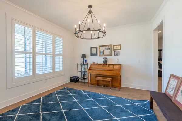 a living room with a furniture and a window