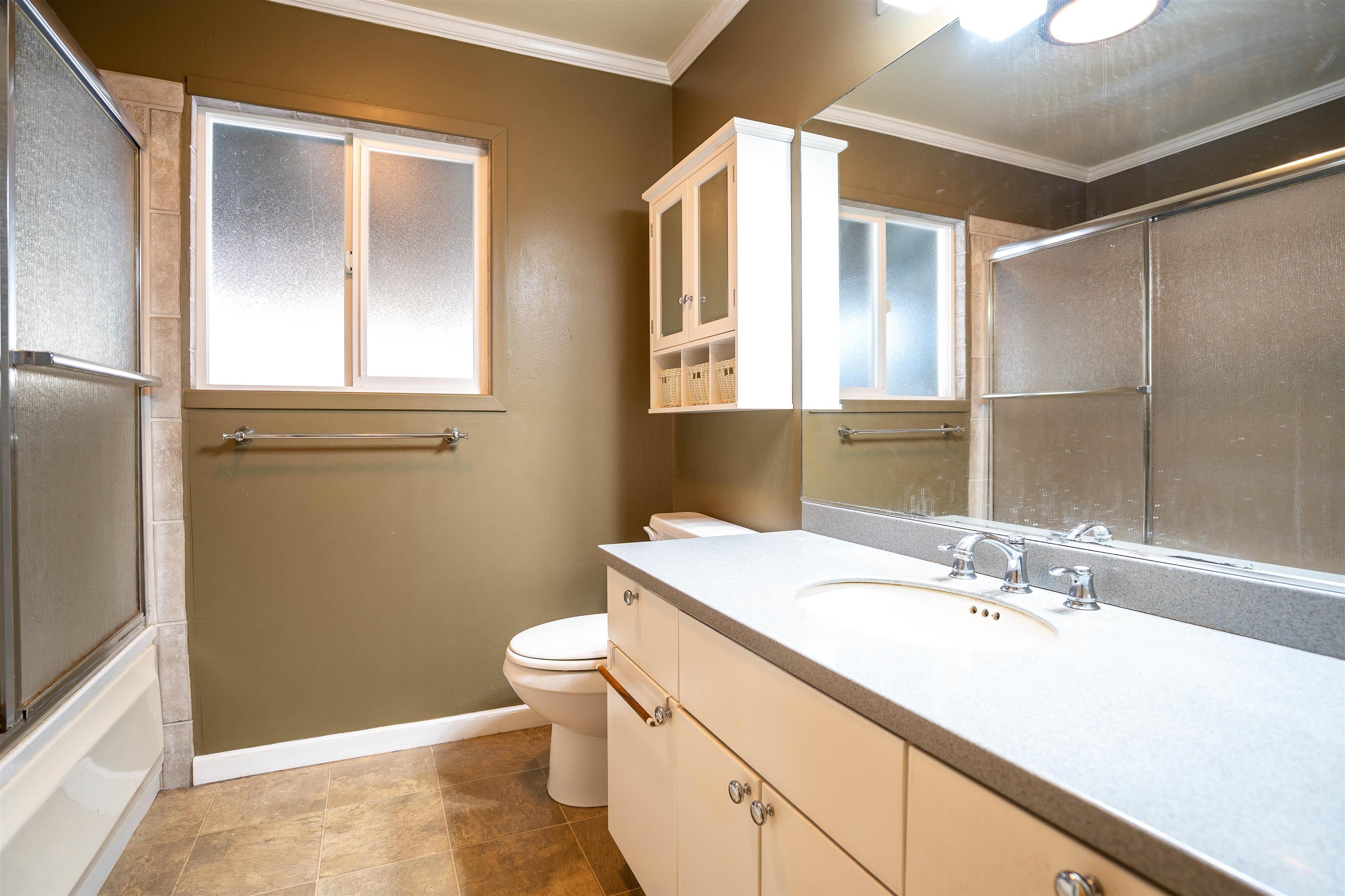 8 Laupapa Place Haiku, HI 96708 - Photo 11 of 30 a bathroom with a sink a toilet and a mirror