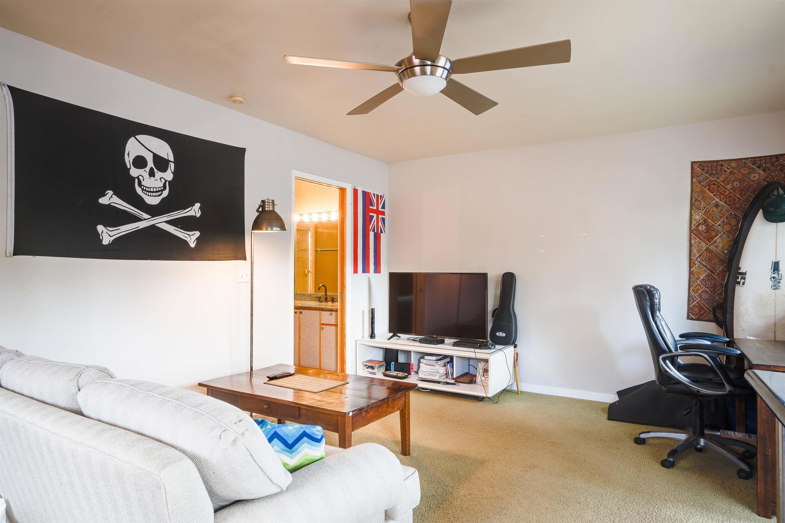 8 Laupapa Place Haiku, HI 96708 - Photo 22 of 30 a living room with furniture and a flat screen tv