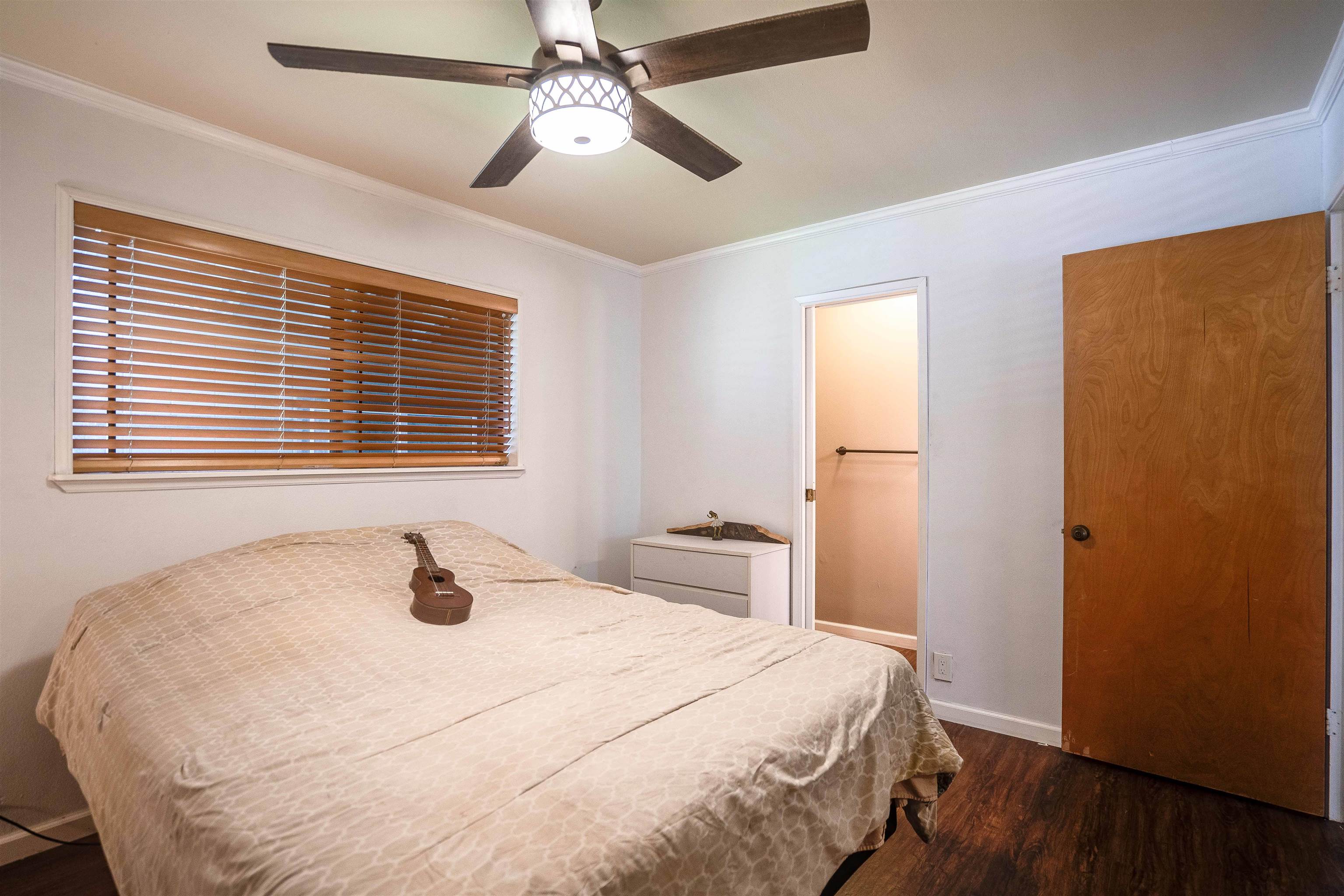 8 Laupapa Place Haiku, HI 96708 - Photo 8 of 30 a bedroom with a bed and a window