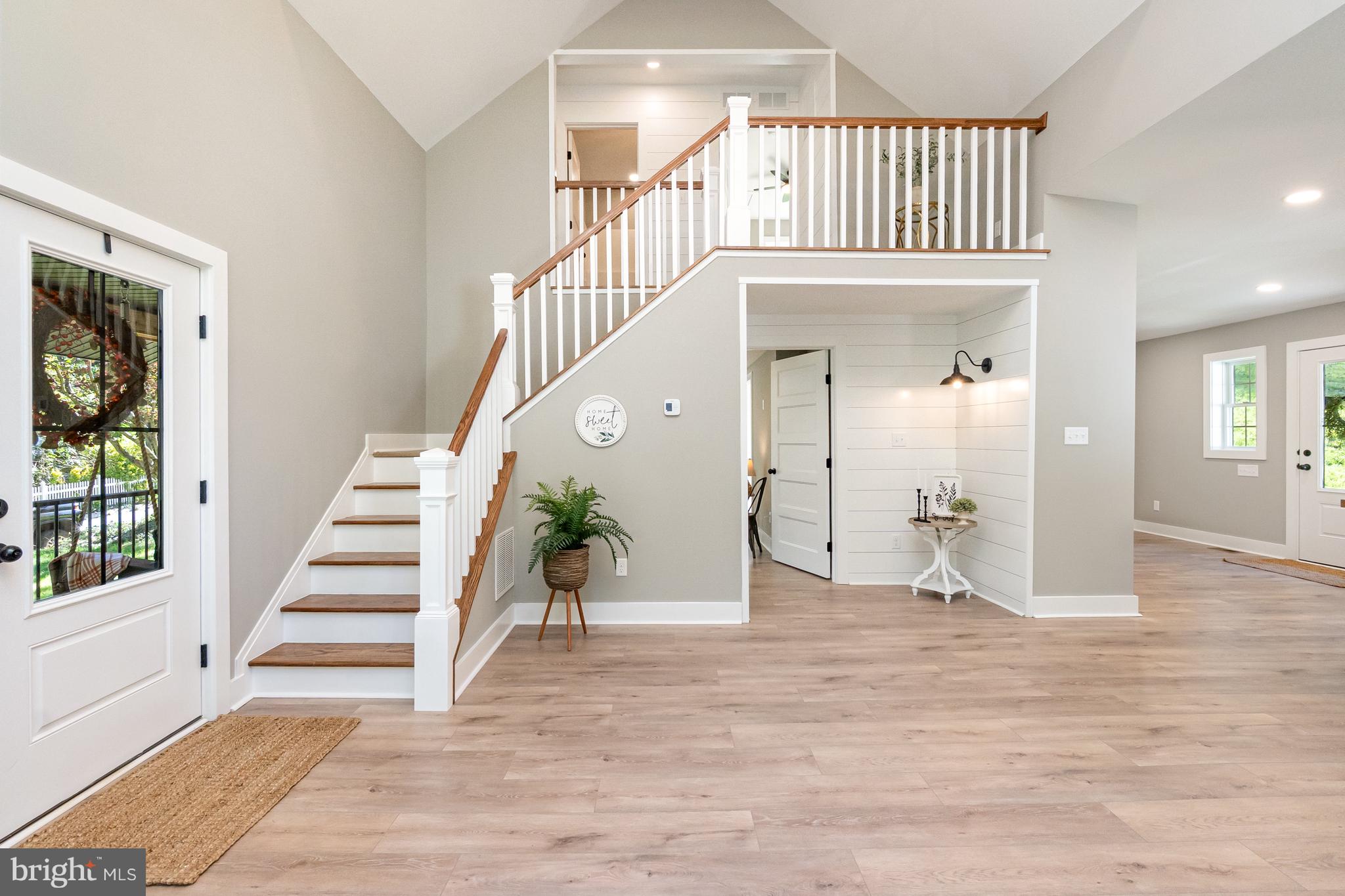 1803 Susquehanna Hall Road Whiteford, MD 21160 - Photo 18 of 49 a view of entryway with wooden floor and stairs