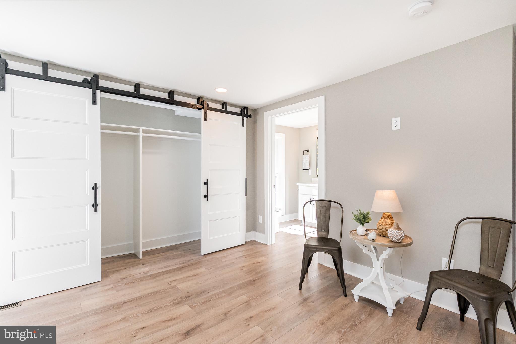 1803 Susquehanna Hall Road Whiteford, MD 21160 - Photo 29 of 49 a view of a room with wooden floor and windows
