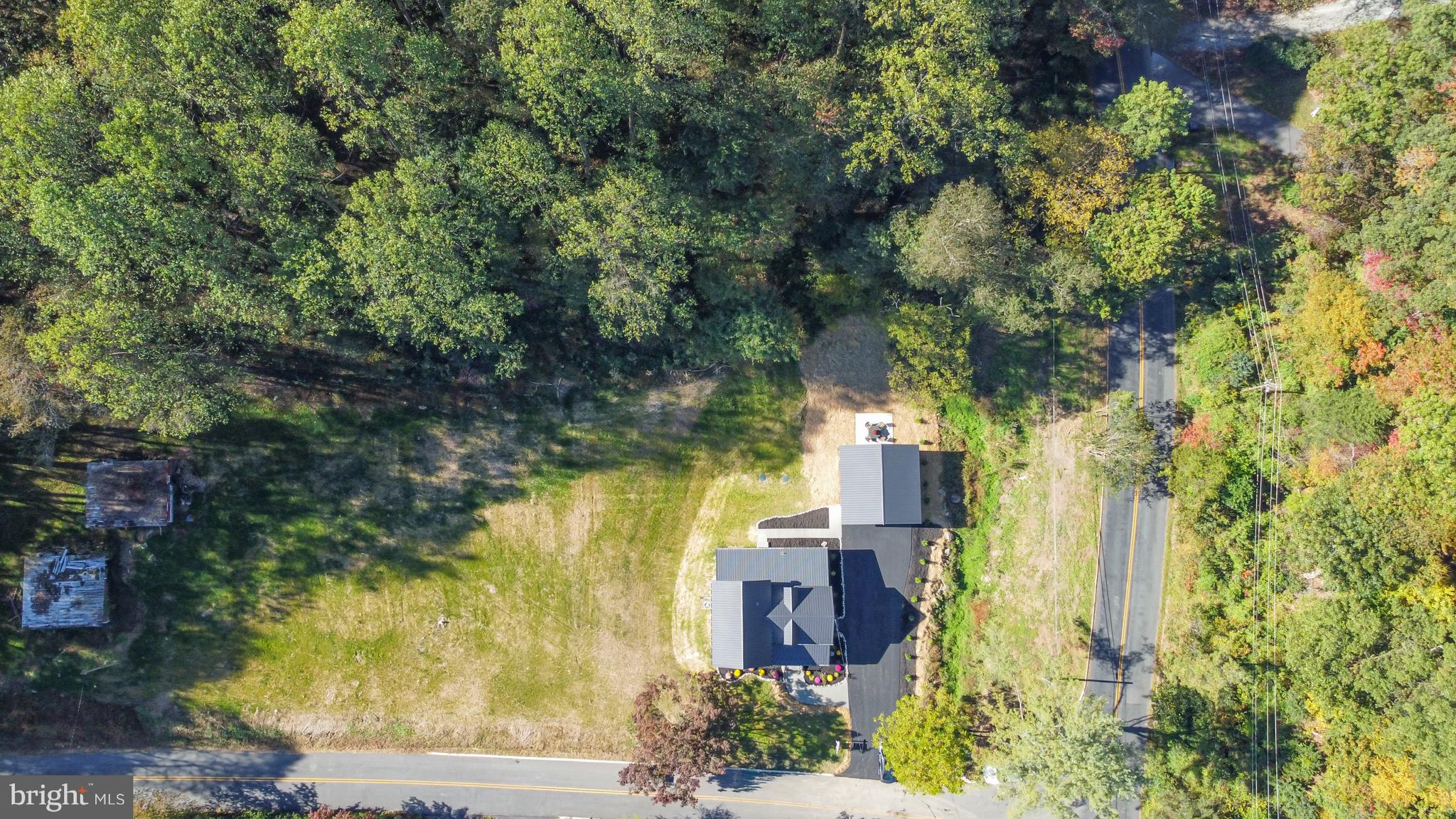 1803 Susquehanna Hall Road Whiteford, MD 21160 - Photo 41 of 49 an aerial view of residential houses with outdoor space and trees