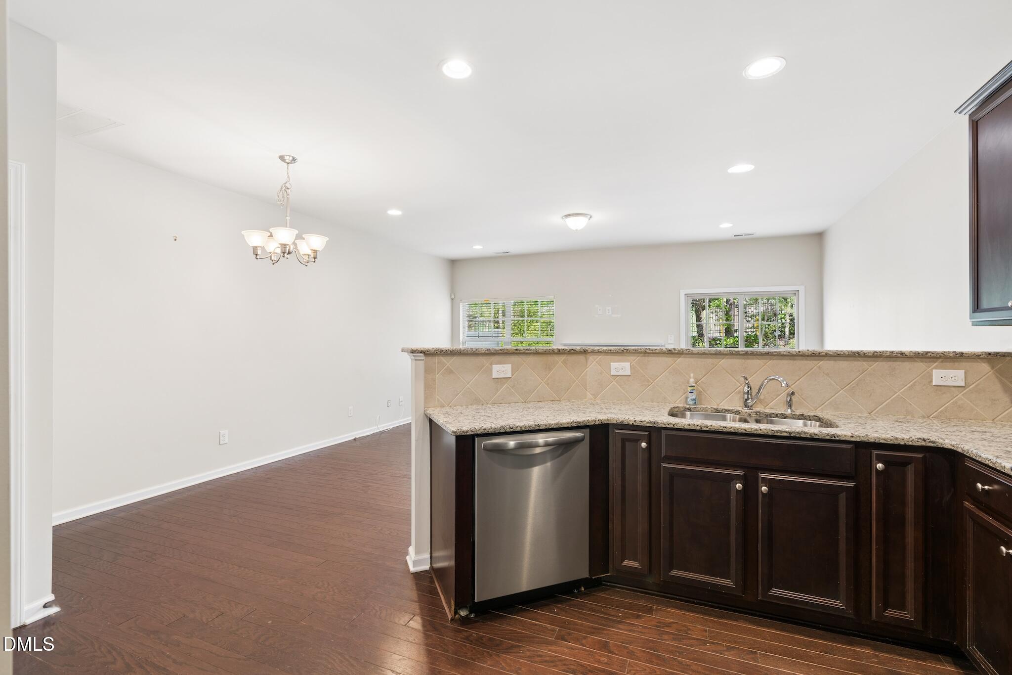 110 Marsena Lane Cary, NC 27513 - Photo 14 of 46 a kitchen with a sink and cabinets
