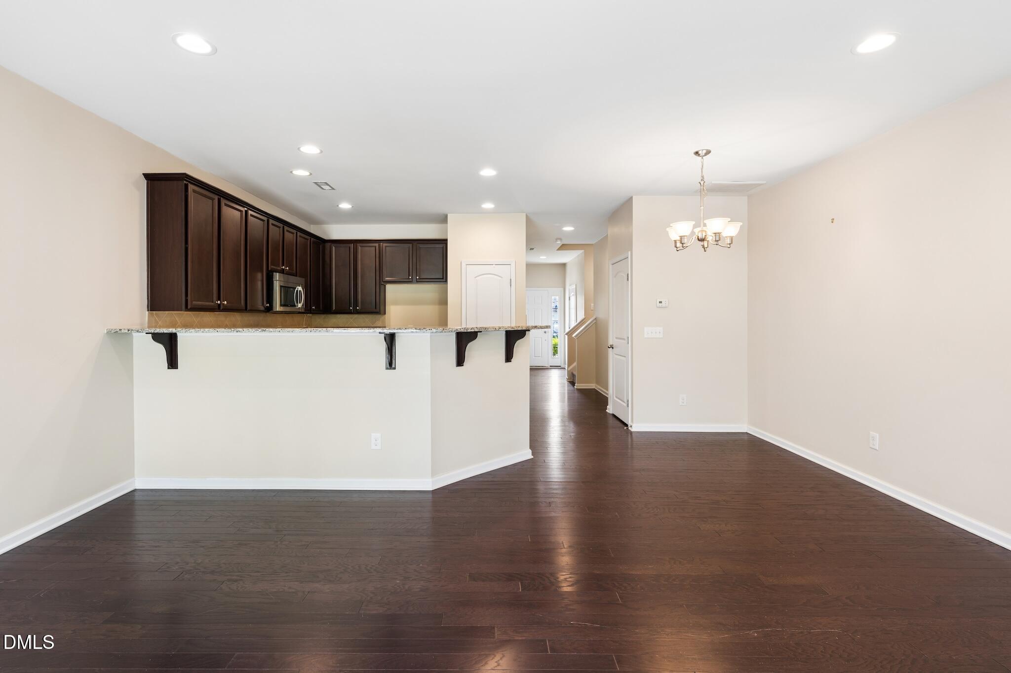 110 Marsena Lane Cary, NC 27513 - Photo 18 of 46 a view of a kitchen with a sink and a refrigerator