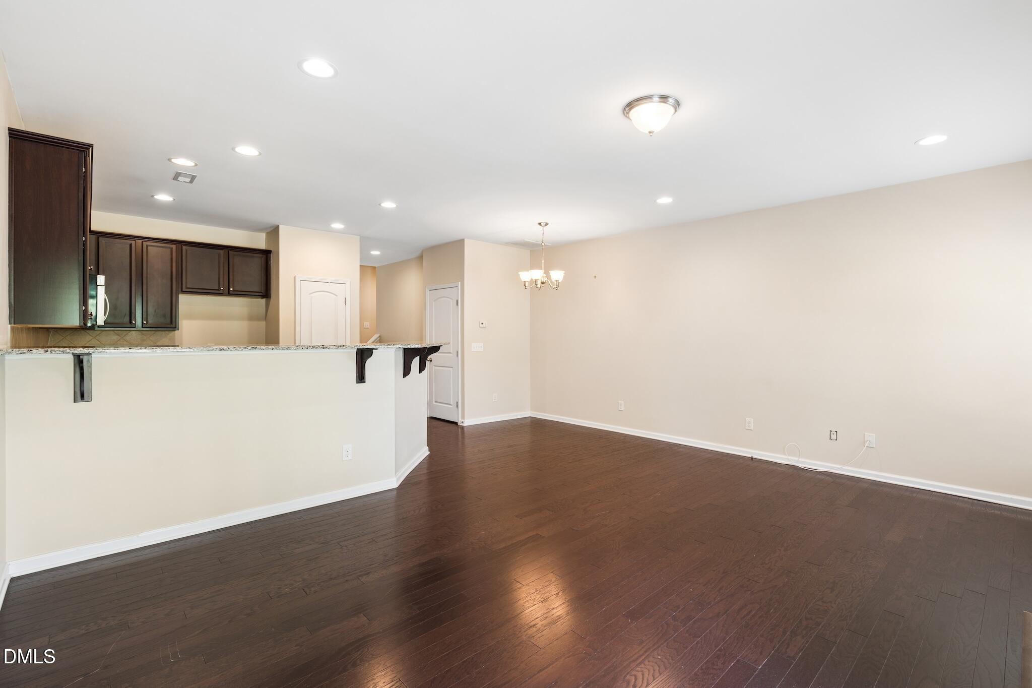 110 Marsena Lane Cary, NC 27513 - Photo 19 of 46 a view of a kitchen with a sink and a microwave