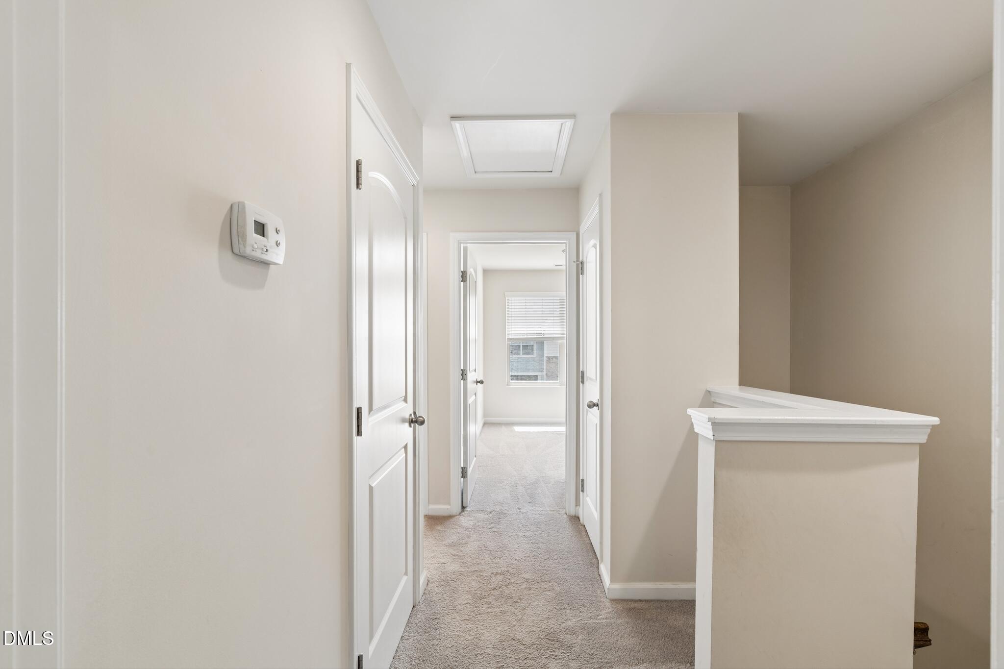 110 Marsena Lane Cary, NC 27513 - Photo 22 of 46 a view of a bathroom from a hallway