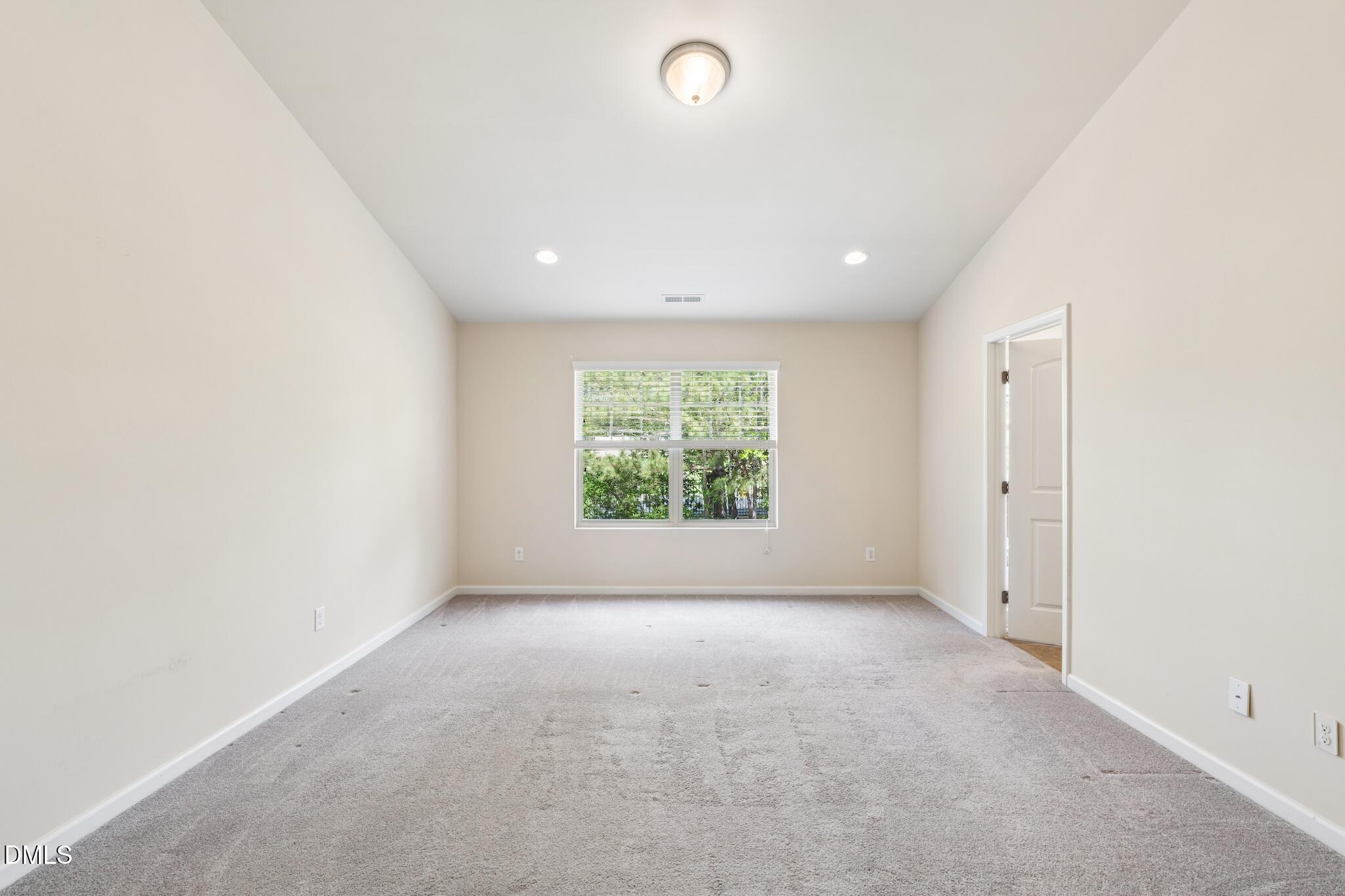 110 Marsena Lane Cary, NC 27513 - Photo 24 of 46 an empty room with windows