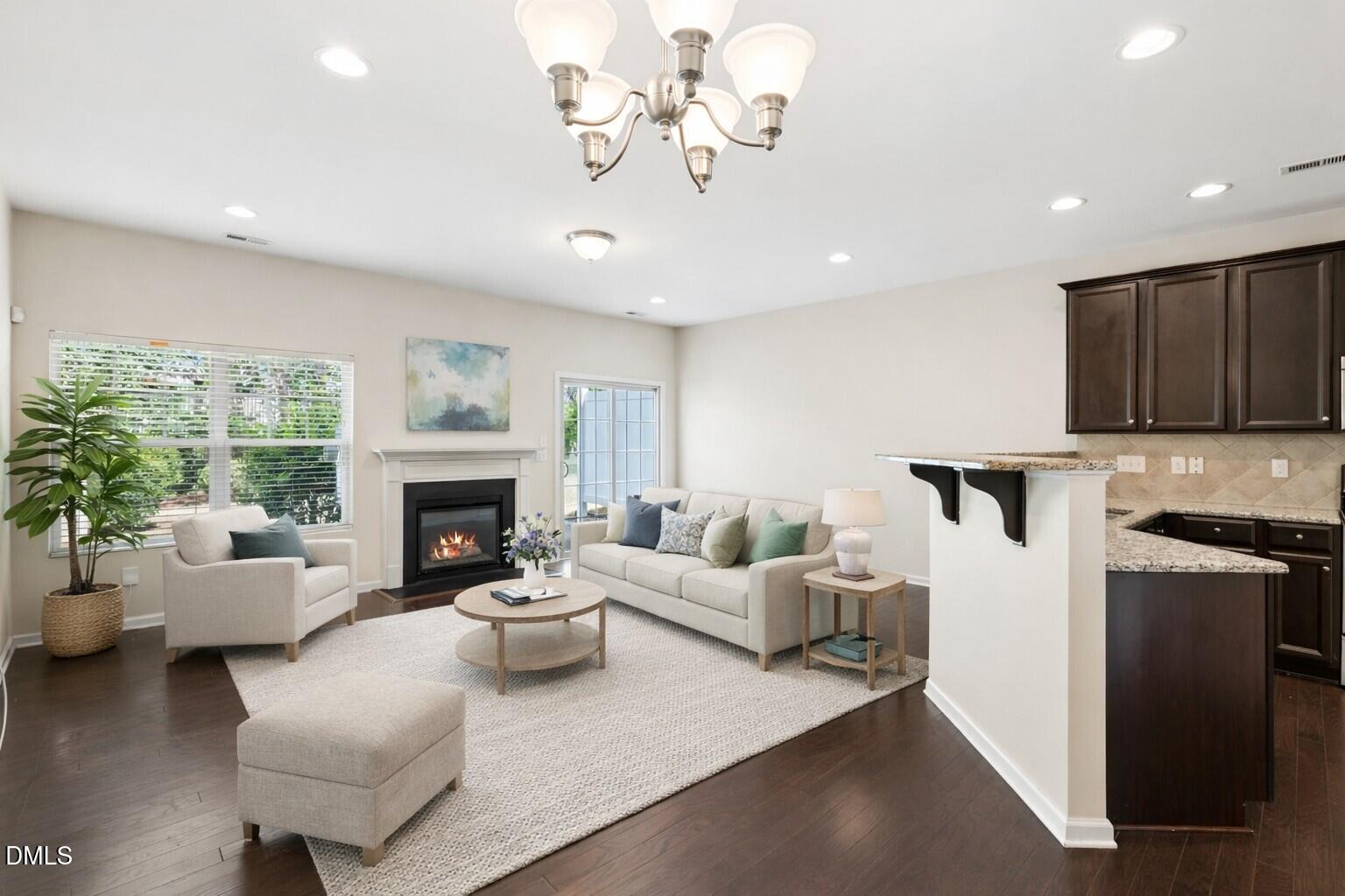 110 Marsena Lane Cary, NC 27513 - Photo 2 of 46 a living room with furniture and a fireplace
