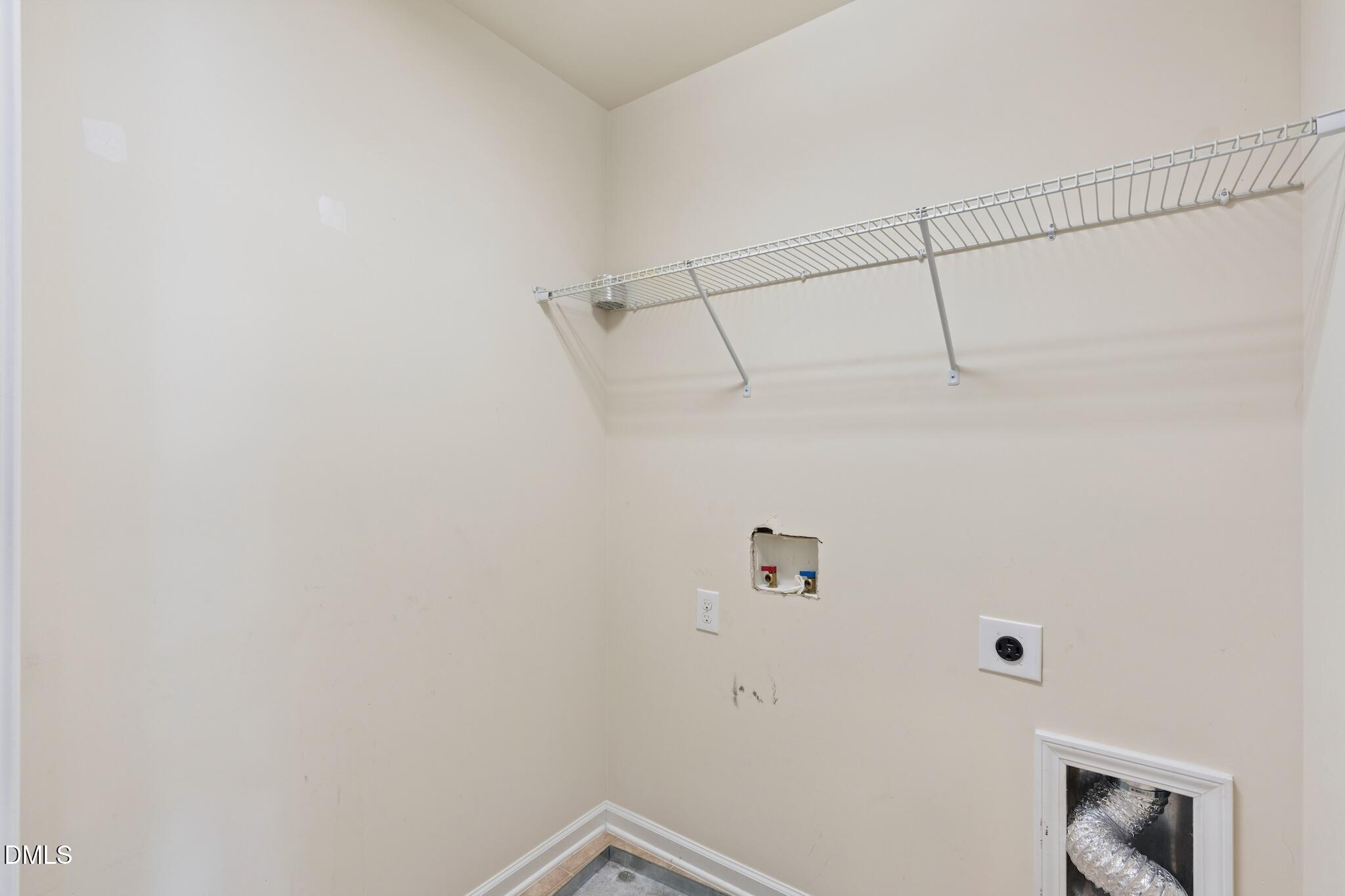 110 Marsena Lane Cary, NC 27513 - Photo 34 of 46 a view of a room with racks on the wall