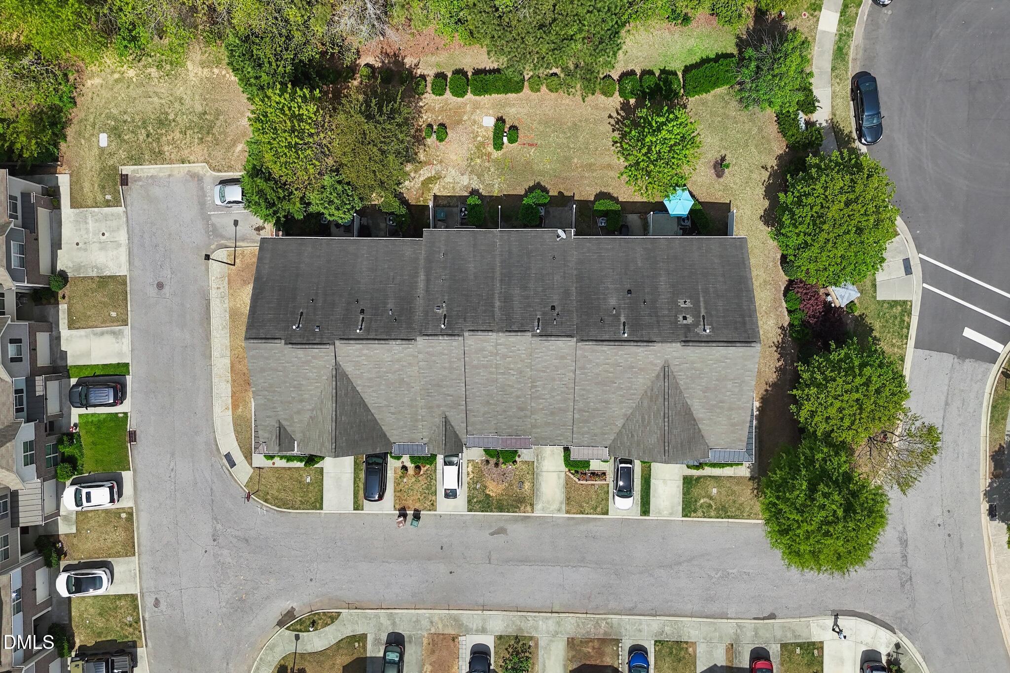 110 Marsena Lane Cary, NC 27513 - Photo 44 of 46 an aerial view of a house with a yard and large tree