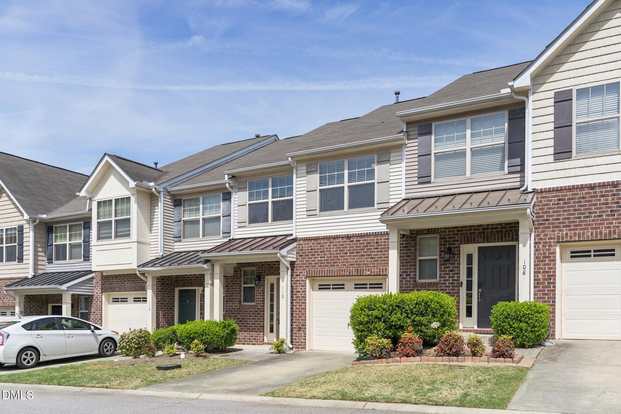 110 Marsena Lane Cary, NC 27513 - Photo 6 of 46 a front view of a house with a yard