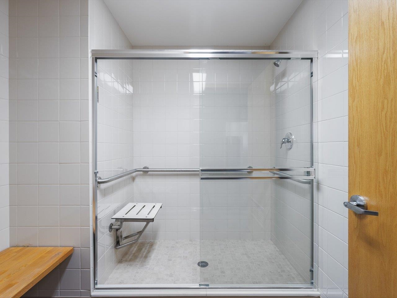 11635 Wange Road Capron, IL 61012 - Photo 20 of 57 a bathroom with a glass shower door