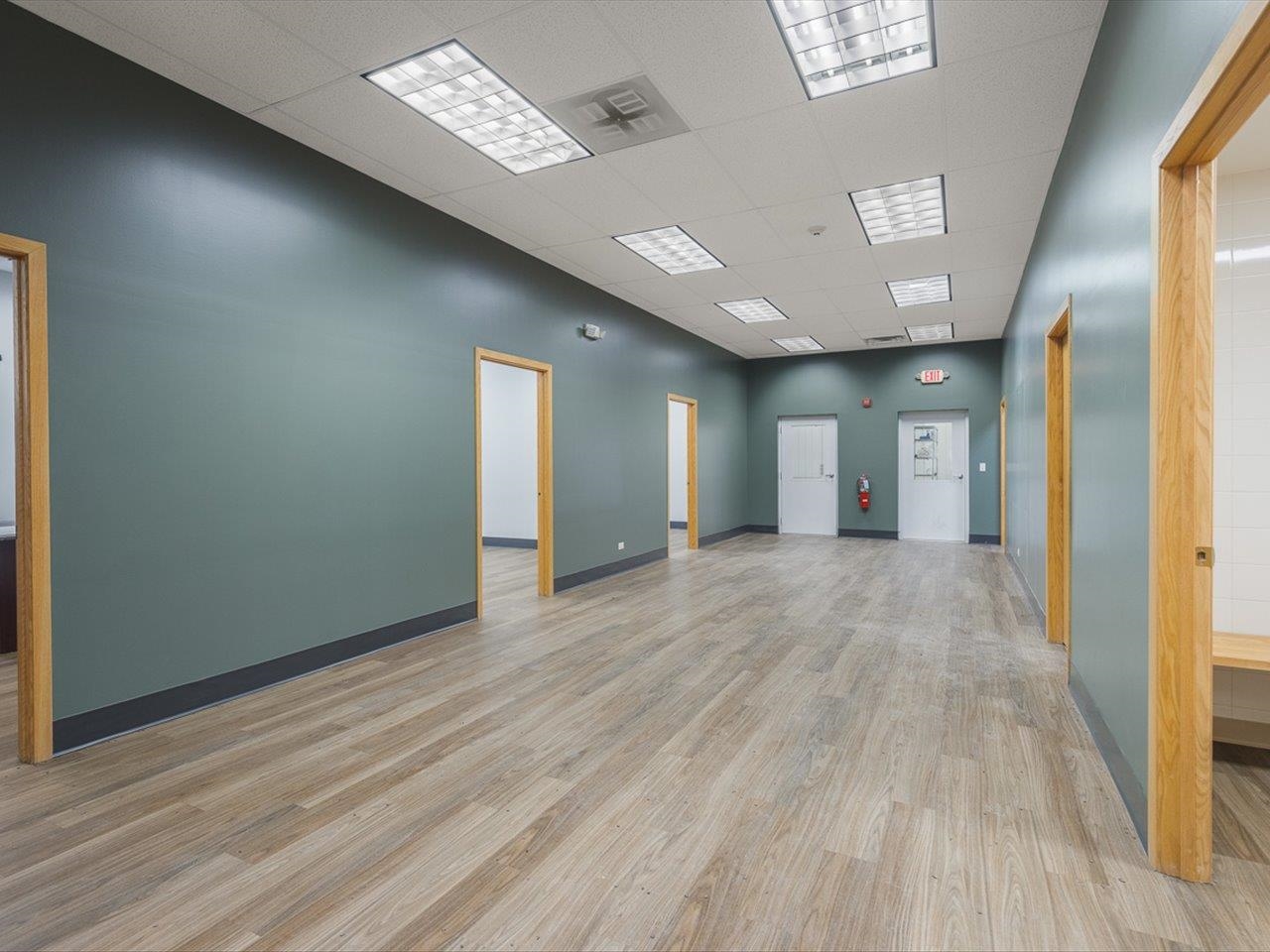 11635 Wange Road Capron, IL 61012 - Photo 22 of 57 a view of an empty room with wooden floor and a window