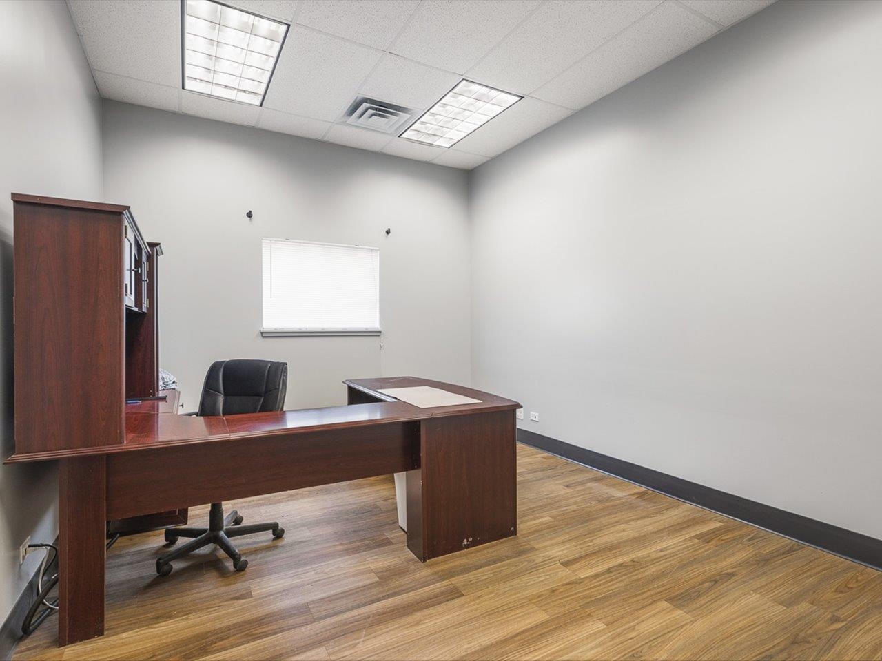 11635 Wange Road Capron, IL 61012 - Photo 55 of 57 a view of a workspace with furniture and a window