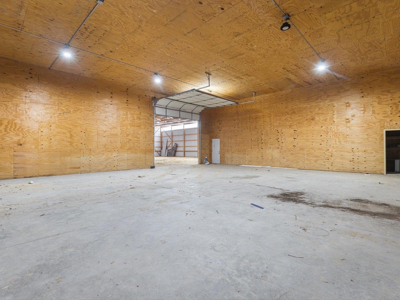 11635 Wange Road Capron, IL 61012 - Photo 6 of 57 a view of a livingroom with a staircase