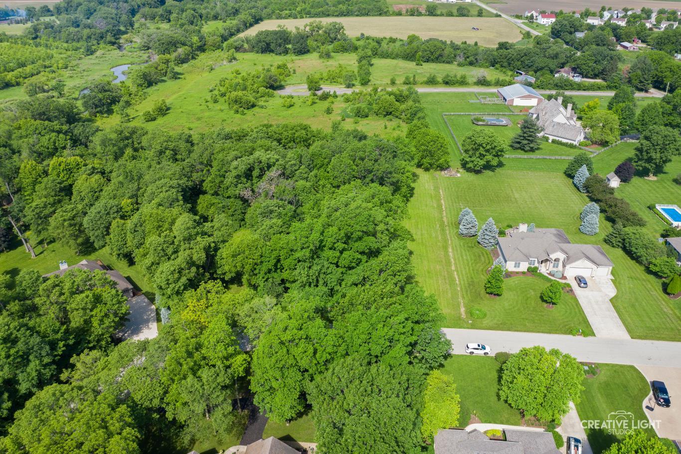 Lot #30 Mitchell Drive Plano, IL 60545 - Photo 5 of 12 an aerial view of a house with a yard