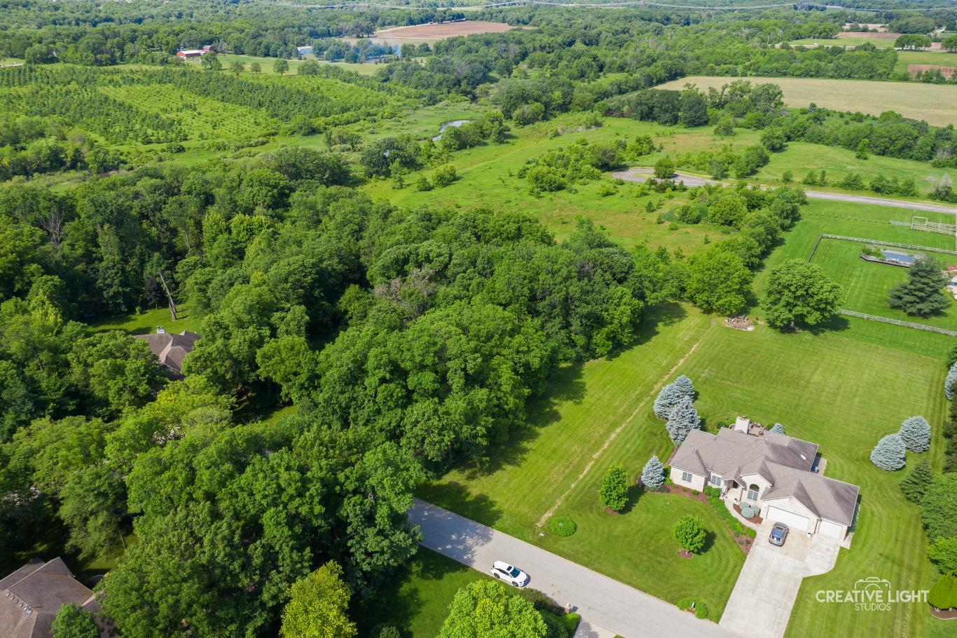 Lot #30 Mitchell Drive Plano, IL 60545 - Photo 6 of 12 an aerial view of a houses with outdoor space and street view