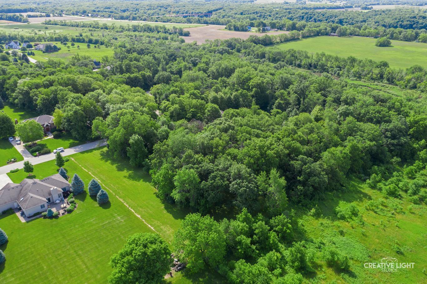 Lot #30 Mitchell Drive Plano, IL 60545 - Photo 7 of 12 an aerial view of a house with a yard
