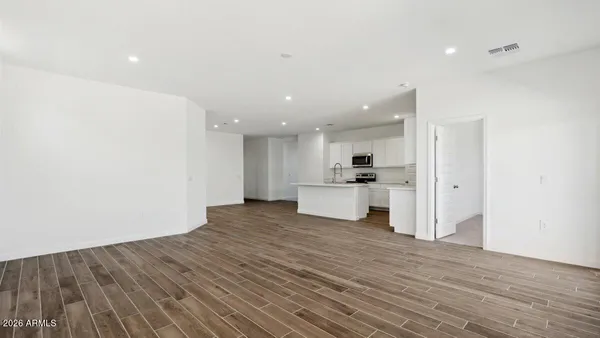 a view of kitchen with wooden floor