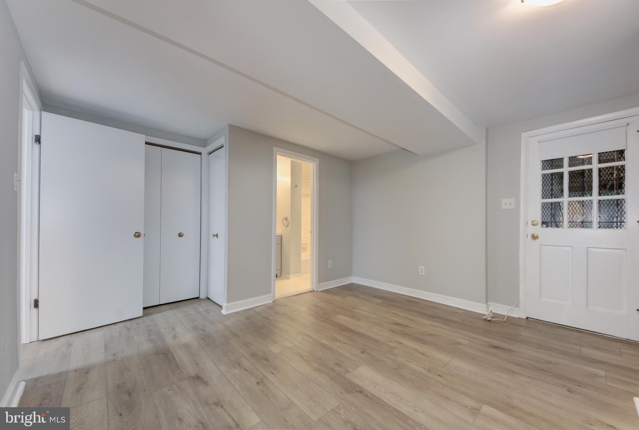 2007 B Kalorama Road Northwest, Unit B Washington, DC 20009 - Photo 12 of 38 Bedroom with rear door to patio